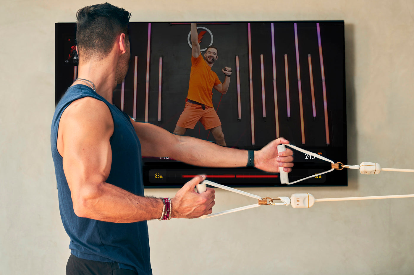 Justin Norris watching LIT On-Demand and doing workout with LIT Axis
